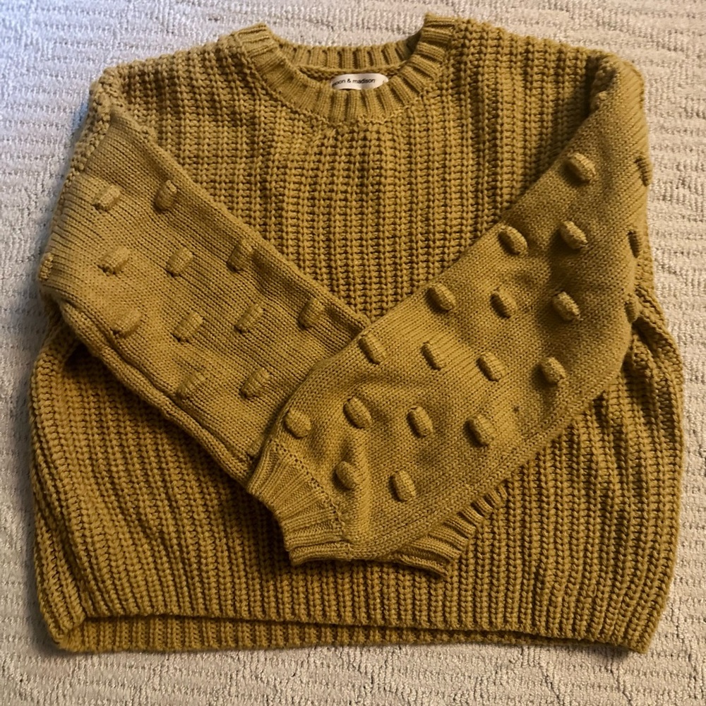 oversized cropped crewneck sweater with statement sleeves